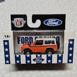 M2 Machines Orange 1976 Ford Bronco Premium Die-cast R75 23-16